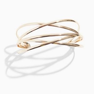 Gold-tone crisscross cuff. Torrid